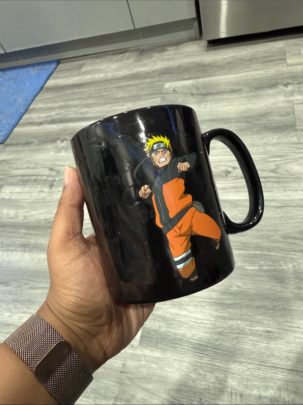 Black Ceramic Mug with Orange Anime Character Graphic - changes with temperature